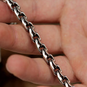 Close-up product view of Mirage chain Bismarck bracelet displaying link texture and shine.