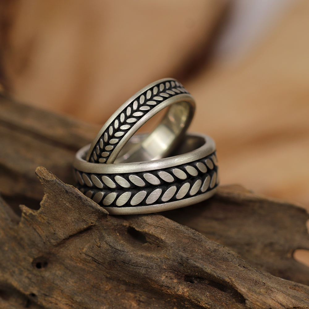 The Eternal Bloom ring displaying polished edges and a subtle design flower motif.