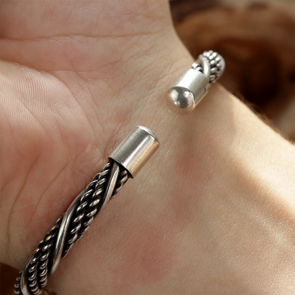 Close up of the Mjolnir silver Viking Bracelet End caps worn on a Wrist